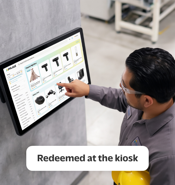 Manufacturing employee redeeming a reward using the Applauz Reward Kiosk