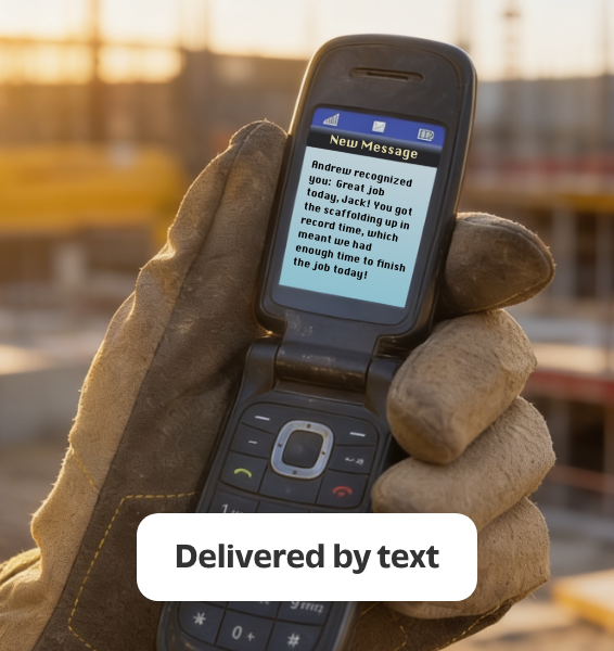 construction worker receiving a recognition via SMS